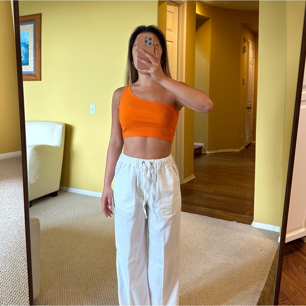 Bright orange one shoulder crop top